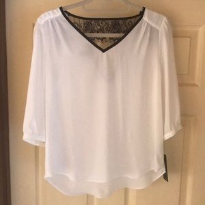 Beige w/black trim,back lace w/triangle opening